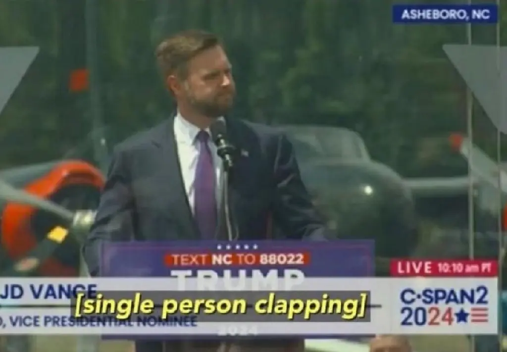 edited news segment with jd vance and caption single person clapping