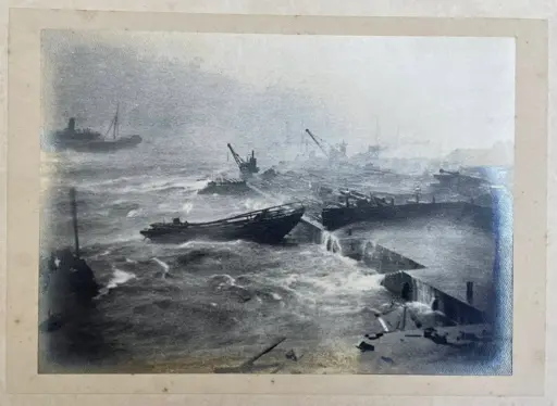 Photo of waves shaking boats and crashing into Hong Kong harbour walls during typhoon of September 1906