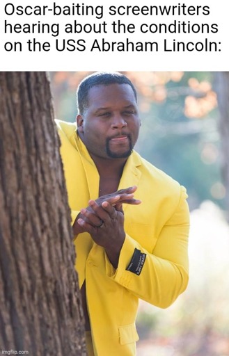 Anthony Adams behind a tree squinting, rubbing his hands together and licking his lips with the following caption: "Oscar-baiting screenwriters hearing about the conditions on the USS Abraham Lincoln"